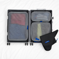 the original packing cube system — clear grey